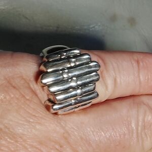 BIG AND BOLD -LADIES -ABSTRACT MOTIF. STERLING SILVER, SIZE 7 RING.